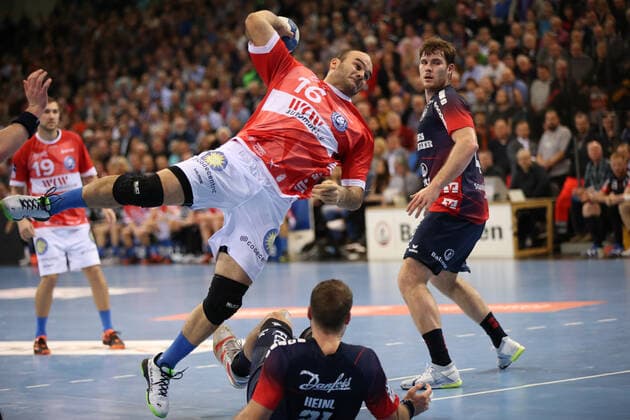 SG Flensburg Handewitt vs. Bergischer HC, LIQUI MOLY Handball Bundesliga, 28 11 19 Flensburg Rafael Baena Gonzalez Bergischer HC, 16 vs. Johannes Golla SG Flensburg Handewitt, 04 and Jacob Heinl Sg Flensburg Handewitt, 21 Copyright: xBEAUTIFULxSPORTS MarioxM.xKobergx