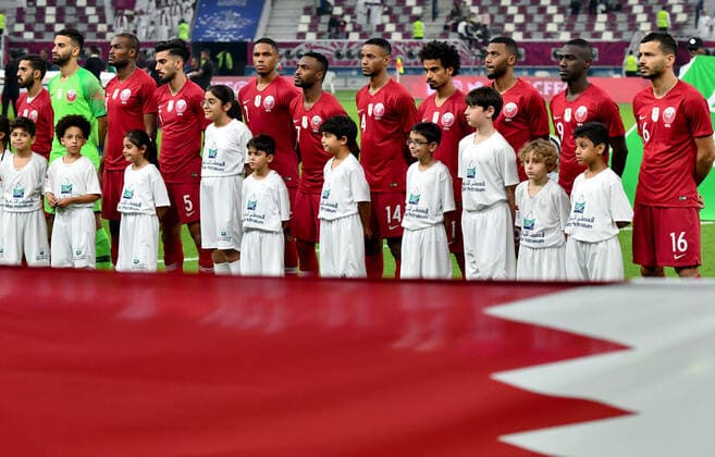 (191130) -- DOHA, Nov. 30, 2019 -- Qatar s players line up prior to the 24th Arabian Gulf Cup 2019 Group A football match between Qatar and Yemen at the Khalifa International Stadium in Doha, capital of Qatar, Nov. 29, 2019. Qatar won 6-0. Nikku) (SP)QATAR-DOHA-FOOTBALL-ARABIAN GULF CUP-QATAR VS YEMEN yangyuanyong 