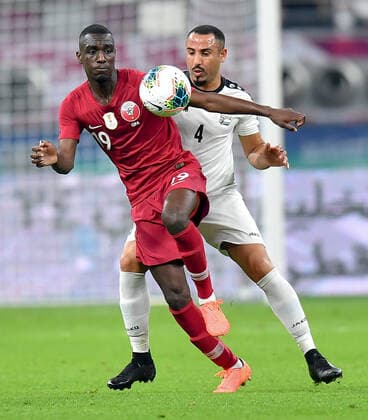 (191130) -- DOHA, Nov. 30, 2019 -- Mudir AL Rudaei (R) of Yemen vies with Al Moez Ali of Qatar during the 24th Arabian Gulf Cup 2019 Group A football match at the Khalifa International Stadium in Doha, capital of Qatar, Nov. 29, 2019. Qatar won 6-0. Nikku) (SP)QATAR-DOHA-FOOTBALL-ARABIAN GULF CUP-QATAR VS YEMEN yangyuanyong 