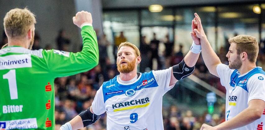 Winner pose Spaeth, Manuel TVB Stuttgart 9 Bitter, Johannes TVB Stuttgart 1 Roethlisberger, Samuel TVB Stuttgart 17 TVB 1898 Stuttgart HSG Nordhorn Lingen HBL LIQUI MOLY 1 Handball BundesligaSCHARRena Stuttgart Baden Wuerttemberg Germany 01 12 19 Handball 15 Spieltag , Baden Wuerttemberg Germany