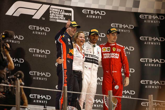 Motorsports: FIA Formula One World Championship, WM, Weltmeisterschaft 2019, Grand Prix of Abu Dhabi, 33 Max Verstappen (NLD, Aston Martin Red Bull Racing), Britta Seeger (GER, Member of the Board of Management of Daimler AG), 44 Lewis Hamilton (GBR, Mercedes AMG Petronas Motorsport), 16 Charles Leclerc (MCO, Scuderia Ferrari Mission Winnow), Abu Dhabi United Arab Emirates