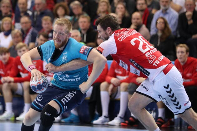 SG Flensburg Handewitt vs. Aalborg Handbold, Handball, EHF Champions League Group Phase, 01 12 19 Flensburg Jim Gottfridsson SG Flensburg Handewitt, 24 against Mats Christiansen Aalborg Handbold, 20 Copyright: xBEAUTIFULxSPORTS MarioxM.xKobergx