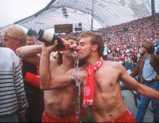 FC Bayern Munich VFL Bochum 5 0 17 06 1989 FC Bayern German Champion 1989 Hans Dieter Flick in front and Luwig Kögl with champagne bottle celebrate the German Championship HM