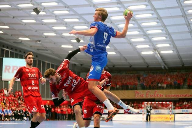 Alexander Falk Ludwigshafen in duel with Jonathan Carlsbogard Lemgo Eulen Ludwigshafen vs. TBV Lemgo, Handball, DHB Cup, 03 12 2019 Eulen Ludwigshafen vs. TBV Lemgo, Handball, DHB Cup, 03 12 2019 Ludwigshafen Copyright: xWeissx Eibner-Pressefotox EP_rws