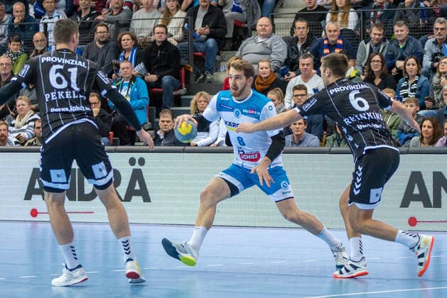 Hendrik Pekeler THW Kiel , Rudolf Faluvegi TVB 1898 Stuttgart and Harald Reinkind THW Kiel Germany, Stuttgart, 03 12 2019, HaBa, DHB Cup, Quarter Finals TVB 1898 Stuttgart vs. THW Kiel, SCHARRena