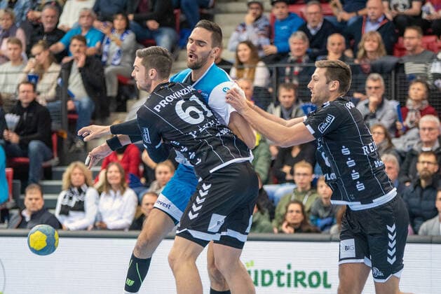 Hendrik Pekeler THW Kiel , Dominik Weiss TVB 1898 Stuttgart and Harald Reinkind THW Kiel Germany, Stuttgart, 03 12 2019, HaBa, DHB Cup, Quarter Finals TVB 1898 Stuttgart vs. THW Kiel, SCHARRena