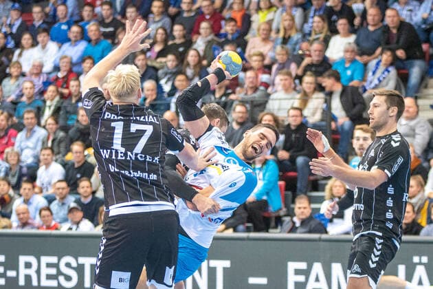 Patrick Wiencek THW Kiel , Dominik Weiss TVB 1898 Stuttgart and Harald Reinkind THW Kiel Germany, Stuttgart, 03 12 2019, HaBa, DHB Cup, Quarter Finals TVB 1898 Stuttgart vs. THW Kiel, SCHARRena