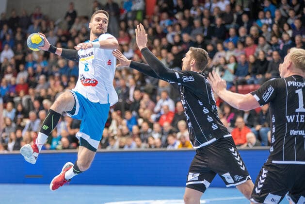 Dominik Weiss TVB 1898 Stuttgart , Hendrik Pekeler THW Kiel and Patrick Wiencek THW Kiel Germany, Stuttgart, 03 12 2019, HaBa, DHB Cup, Quarter Finals TVB 1898 Stuttgart vs. THW Kiel, SCHARRena