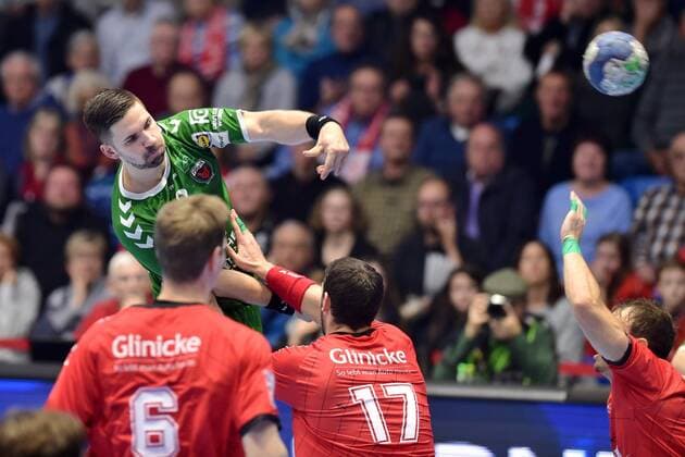 Fabian Wiede Fuechse Berlin at the throw Felix Danner MT Melsungen NR17 , GER, MT Melsungen Fuechse Berlin, Handball, DHB Cup, 03 12 2019, GER, MT Melsungen Fuechse Berlin, Handball, DHB Cup Men, 03 12 2019 Kassel Copyright: xSippel xEibner-Pressefotox EP_rsl
