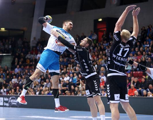 BAU 03 12 2019 Stuttgart Handball TVB Stuttgart vs. THW Kiel, v l Dominik Weiß TVB , Hendrik Pekeler Kiel