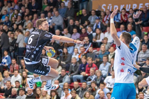 Harald Reinkind THW Kiel and Dominik Weiss TVB 1898 Stuttgart Germany, Stuttgart, 03 12 2019, HaBa, DHB Cup, quarter finals TVB 1898 Stuttgart vs. THW Kiel, SCHARRena