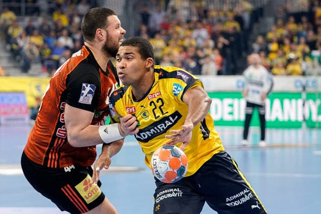 v li Ilija Brozovic Hannover, 44 , Mads Mensah Larsen RNL, 22 , duel, game scene, duel, duel, tackle, tackling, dynamics, action, action, 04 12 2019, Mannheim Germany , handball, DHB Cup, Rhein Neckar Löwen TSV Hannover Burgdorf xozx