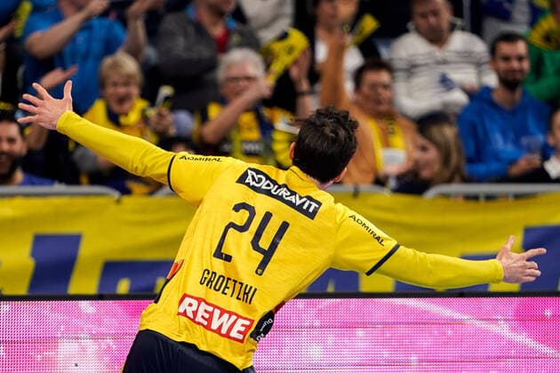 goal scorer Patrick Groetzki RNL, 24 , cheers on a goal, jubilation, goal jubilation, goal success, celebrate the goal, goal, celebration, jubilation about the goal, optimistic, game scene, highlight, single picture, action, action, 04 12 2019, Mannheim Germany , handball, DHB Cup, Rhein Neckar Löwen TSV Hannover Burgdorf xozx
