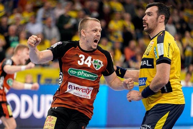 v li goalscorer Morten Olsen Hannover, 34 , Gedeon Guardiola RNL, 30 , cheers about a goal, cheers, goal jubilation, goal success, celebrate the goal, goal, celebration, cheers about the goal, optimistic, game scene, highlight, single picture, action, action, 04 12 2019, Mannheim Germany , handball, DHB trophy, Rhein Neckar Löwen TSV Hannover Burgdorf xozx