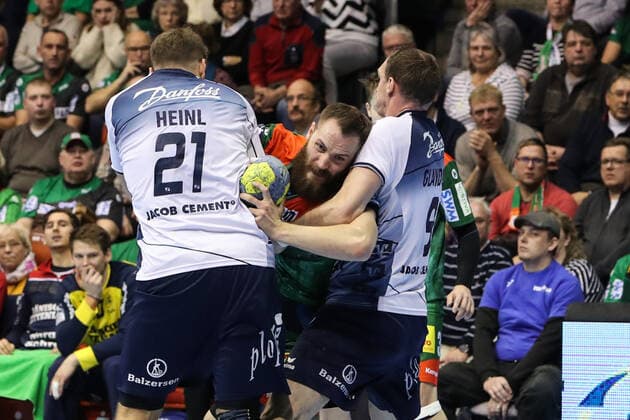Moritz Preuss SC Magdeburg against Holger Glandorf re and Jacob Heinl SG Flensburg Handewitt Handball Bundesliga Season 2019 2020 SC Magdeburg vs SG Flensburg Handewitt in the GETEC Arena in Magdeburg Action,Handball,MannMänner,Germany,05 12 2019