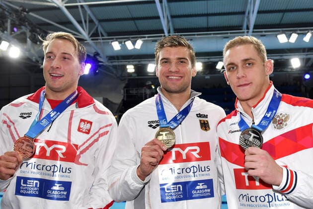 Bilder des Jahres 2019, Sport 12 Dezember Sport Themen der Woche KW49 CIESLAK Marcin Poland POL Bronze KUSCH Marius Germany GER Gold Medal VEKOVISHCHEV Mikhail Russia RUS Silver MEdal Men s 100m Butterfly Final Glasgow 05 12 2019 XX LEN European Short Course Swimming Championships 2019 Tollcross International Swimming Centre Photo Andrea Staccioli Deepbluemedia Insidefoto andreaxstaccioli