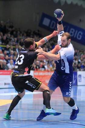 2 Bundesliga Handball VfL Luebeck Schwartau HSC 2000 Coburg 06 12 2019, Hansehalle Luebeck, GER, 2 Bundesliga Handball VfL Luebeck Schwartau HSC 2000 Coburg pictured picture shows Jan Schult VfL Luebeck Schwartau in duel with Marcel Timm HSC 2000 Coburg nordphotox xTauchnitz nph00059