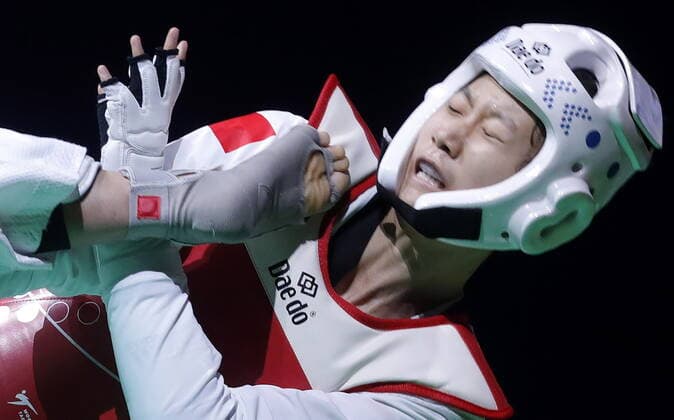 Bilder des Jahres 2019, Sport 12 Dezember Sport Themen der Woche KW49 Sport Bilder des Tages MOSCOW, RUSSIA â€“ DECEMBER 7, 2019: China s Zongshi Luo fights in a women s 57kg bout during the 2019 World Taekwondo Grand Prix Final, at the Dynamo Sports Palace in Krylatskoye. Mikhail Japaridze TASS  TS0C654A