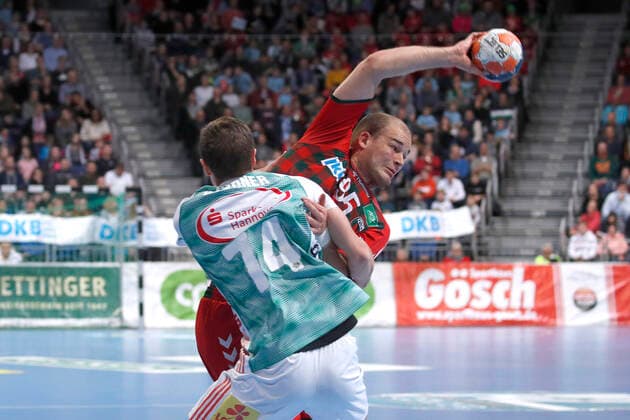 08 12 2019, TUI Arena, Hannover, league match, 1 Bundesliga, TSV Hannover Burgdorf vs Fuechse Berlin, in picture Vincent Buechner 74, Han Burgdorf in duel with Paul Drux 95, Berlin TSV Hannover Burgdorf vs Fuechse Berlin