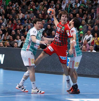08 12 2019, TUI Arena, Hannover, league game, 1 Bundesliga, TSV Hannover Burgdorf vs Fuechse Berlin, in picture Joshua Thiele 13, Han Burgdorf and Evgeni Pevnov 14, Han Burgdorf in duel with Jacob Tandrup Holm 6, Berlin TSV Hannover Burgdorf vs Fuechse Berlin