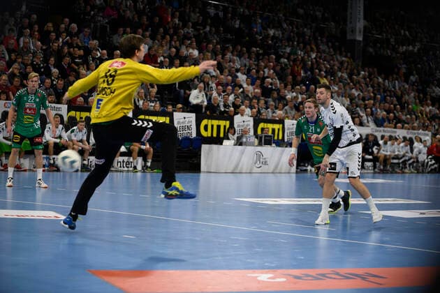 Niclas Ekberg THW Kiel, 18 against Malte Semisch GWD, 16 , Handball Bundesliga, Liqui Moly HBL, Men, 16 Matchday, THW Kiel vs. GWD Minden, 08 12 19 Kiel Sparkassen Arena Schleswig Holstein Germany