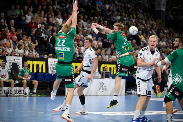 Nikola Bilyk THW Kiel, 53 throws into the block of Marian Michalczik GWD, 22 , Handball Bundesliga, Liqui Moly HBL, Men, 16 Matchday, THW Kiel vs. GWD Minden, 08 12 19 Kiel Sparkassen Arena Schleswig Holstein Germany