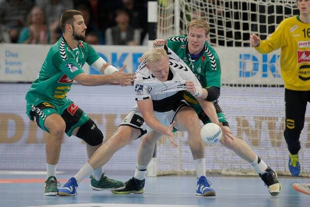 1 Handball Bundesliga THW Kiel TSV GWD Minden, Kiel, 8 12 2019 Patrick Wiencek Kiel, 17 in duel against Lucas Meister Minden, 2 and Magnus Gullerud Minden, 21 Copyright: xBEAUTIFULxSPORTS DRPx