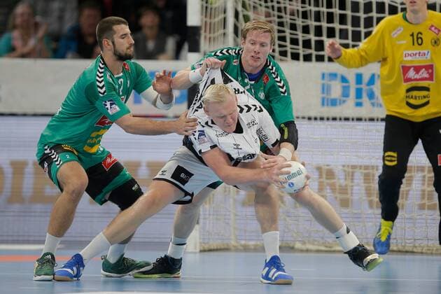 1 Handball Bundesliga THW Kiel TSV GWD Minden, Kiel, 8 12 2019 Patrick Wiencek Kiel, 17 in duel against Lucas Meister Minden, 2 and Magnus Gullerud Minden, 21 Copyright: xBEAUTIFULxSPORTS DRPx
