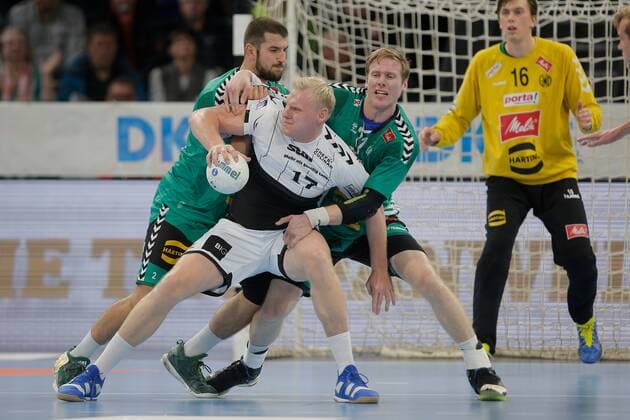 1 Handball Bundesliga THW Kiel TSV GWD Minden, Kiel, 8 12 2019 Patrick Wiencek Kiel, 17 in duel against Lucas Meister Minden, 2 and Magnus Gullerud Minden, 21 Copyright: xBEAUTIFULxSPORTS DRPx