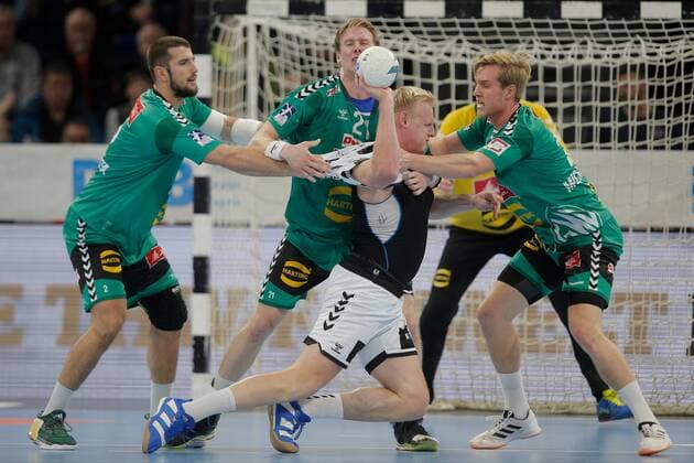 1 Handball Bundesliga THW Kiel TSV GWD Minden, Kiel, 8 12 2019 Patrick Wiencek Kiel, 17 in duel against Lucas Meister Minden, 2 , Magnus Gullerud Minden, 21 and Marian Michalczik Minden, 22 Copyright: xBEAUTIFULxSPORTS DRPx