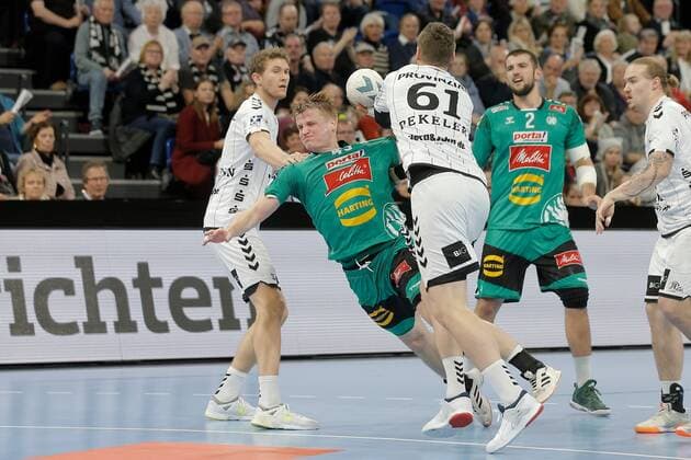 1 Handball Bundesliga THW Kiel TSV GWD Minden, Kiel, 8 12 2019 Christoph Reißky Minden, 43 in duel against Hendrik Pekeler Kiel, 61 and Magnus Landin Jacobsen Kiel, 7 Copyright: xBEAUTIFULxSPORTS DRPx