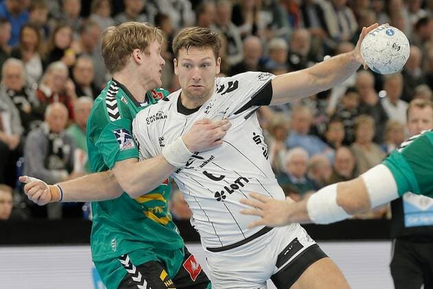 1 Handball Bundesliga THW Kiel TSV GWD Minden, Kiel, 8 12 2019 Harald Reinkind Kiel, 6 in duel against Magnus Gullerud Minden, 21 Copyright: xBEAUTIFULxSPORTS DRPx