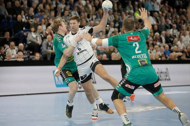 1 Handball Bundesliga THW Kiel TSV GWD Minden, Kiel, 8 12 2019 Harald Reinkind Kiel, 6 in duel against Magnus Gullerud Minden, 21 Copyright: xBEAUTIFULxSPORTS DRPx