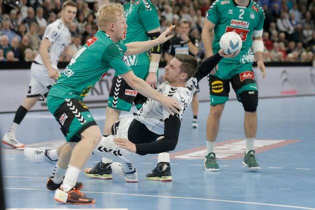 1 Handball Bundesliga THW Kiel TSV GWD Minden, Kiel, 8 12 2019 Hendrik Pekeler Kiel, 61 in duel against Kevin Gulliksen Minden, 44 Copyright: xBEAUTIFULxSPORTS DRPx