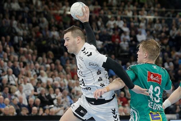 1 Handball Bundesliga THW Kiel TSV GWD Minden, Kiel, 8 12 2019 Miha Zarabec Kiel, 24 in duel against Christoph Reißky Minden, 43 Copyright: xBEAUTIFULxSPORTS DRPx