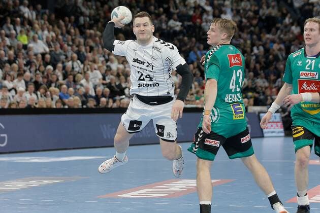 1 Handball Bundesliga THW Kiel TSV GWD Minden, Kiel, 8 12 2019 Miha Zarabec Kiel, 24 in duel against Christoph Reißky Minden, 43 Copyright: xBEAUTIFULxSPORTS DRPx