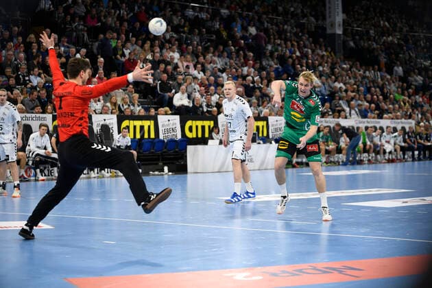 Marian Michalczik GWD, 22 against Niklas Landin Jacobsen THW Kiel, 1 , Handball Bundesliga, Liqui Moly HBL, Men, 16 Matchday, THW Kiel vs. GWD Minden, 08 12 19 Kiel Sparkassen Arena Schleswig Holstein Germany