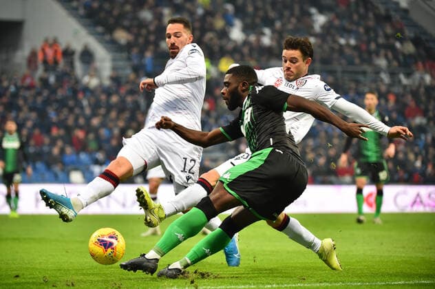 Photo Massimo Paolone LaPresse December 8, 2019 Reggio Emilia, Italy soccer Sassuolo vs Cagliari - Italian Football Championship League A TIM 2019 2020 - Mapei stadium In the pic: Jeremie Boga (U.S.Sassuolo) competes for the ball with Fabrizio Cacciatore (Cagliari Calcio)  Copyright: xMassimoxPaolone LaPressex