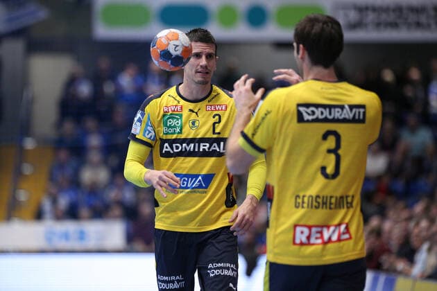 v l Andy Schmid Rhein Neckar Loewen 2 , Uwe Gensheimer Rhein Neckar Loewen 3 GER, Handball, 1 Bundesliga, TBV Lemgo Lippe vs. Rhein Neckar Loewen, 12 12 2019 Lemgo Copyright: xStrohdiekx Eibner-Pressefotox EP_jsk