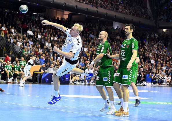 12 12 2019, xlakx, Handball Bundesliga, Fuechse Berlin THW Kiel emspor, from left to right Patrick Wiencek THW Kiel 17 ,Paul Drux Fuechse Berlin 95 ,Marko Kopljar Fuechse Berlin 35 Berlin