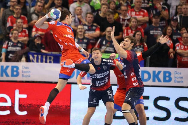 SG Flensburg Handewitt vs HBW Balingen, LIQUI MOLY Handball Bundesliga, 12 12 19 Flensburg Jona Schoch HBW Balingen Weilstetten, 22 against Lasse Svan Hansen SG Flensburg Handewitt, 11 and Magnus Roed SG Flensburg Handewitt, 77 Copyright: xBEAUTIFULxSPORTS MarioxM.xKobergx