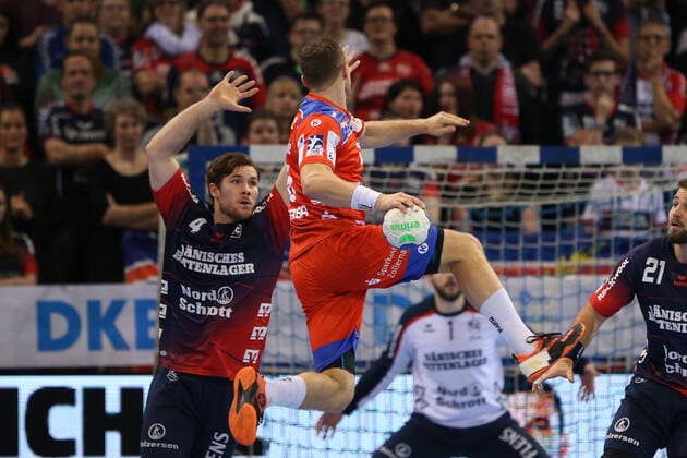 SG Flensburg Handewitt vs. HBW Balingen, LIQUI MOLY Handball Bundesliga, 12 12 19 Flensburg Martin Strobel HBW Balingen Weilstetten, 15 against Johannes Golla SG Flensburg Handewitt, 04 Copyright: xBEAUTIFULxSPORTS MarioxM.xKobergx
