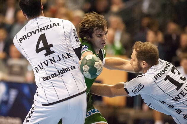 Jacob Tandrup Holm DK 6 Füchse Berlin sits down at the penalty area through action game scene landscape horizontal event event foxes Berlin vs. THW Kiel HBL Handball Bundesliga 2019 20 17 game day location location location Max Schmeling Halle Berlin Germany Germany Europe Date 12 12 2019 Stiehl Photography