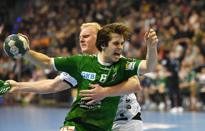Jacob Tandrup Holm Füchse , at the throw, behind Patrick Wiencek Kiel , Füchse Berlin THW Kiel 1 Bundesliga, DKB Handballbundesliga, 2019 2020 Men, Men, Men, Handball, Germany, Germany, Max Schmeling Halle Berlin, 12 12 2019
