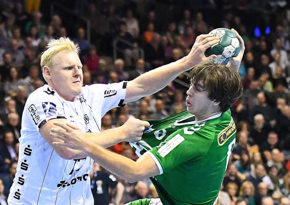 12 12 2019, xlakx, Handball Bundesliga, Fuechse Berlin THW Kiel emspor, v l Duel Patrick Wiencek THW Kiel 17 ,Jacob Tandrup Holm Fuechse Berlin 6 Berlin