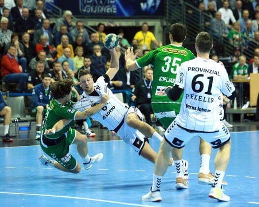 GER, DHB, 1 HBL, FUECHSE BERLIN VS THW KIEL 12 12 2019, Max Schmeling Halle, Berlin, GER, DHB, 1 HBL, FUECHSE BERLIN VS THW KIEL, DHB regulations prohibit any use of photographs as image sequences and or quasi video in picture Jacob Tandrup Holm Fuechse Berlin 6 , Marco Kopljar Fuechse Berlin 35 , Hendrik Pekeler THW Kiel 61 , Harald Reinkind THW Kiel 6 nordphotox xEngler nph00076