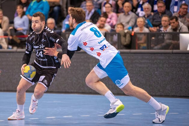Miha Zarabec THW Kiel and Rudolf Faluvegi TVB 1898 Stuttgart Germany, Stuttgart, 15 12 2019, Haba, Bundesliga TVB 1898 Stuttgart vs. THW Kiel, Porsche Arena