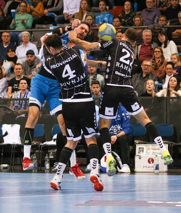15 12 2019, Germany, Stuttgart, Handball 1 Bundesliga Season 2019 2020 TVB 1898 Stuttgart vs. THW Kiel vs. Domagoj Duvnak THW , Dominik Weiß TVB , Ole Rahmel THW