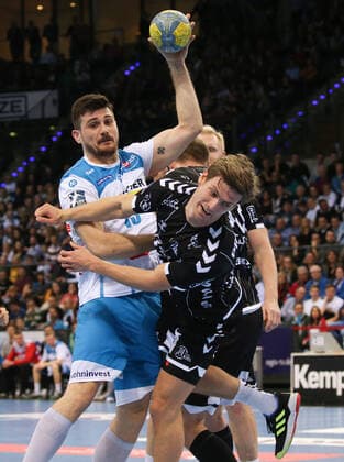 15 12 2019, Germany, Stuttgart, Handball 1 Bundesliga Season 2019 2020 TVB 1898 Stuttgart vs. THW Kiel vs. Robert Markotic TVB , Rune Dahmke THW