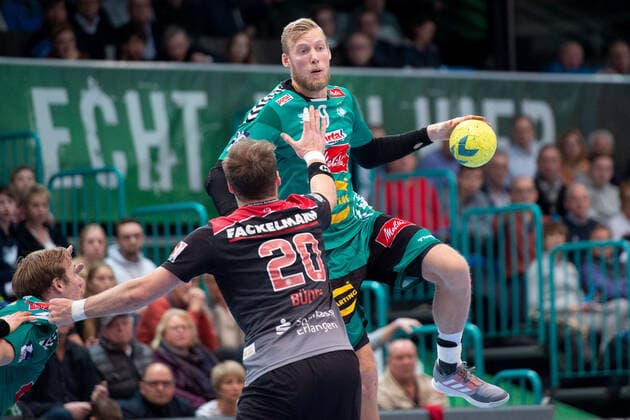 Minden, Germany 15 12 2019 1 Handball Bundesliga 2019 2020 GWD Minden vs HC Erlangen L R Nico Büdel Erlangen , Christoffer Rambo Minden Minden North Rhine-Westphalia Germany Kampa Halle